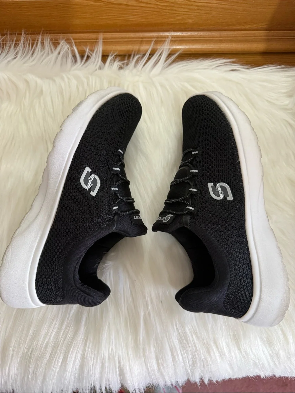 Skechers Women's Black Knit Slip-On Athletic Sneakers with White Sole